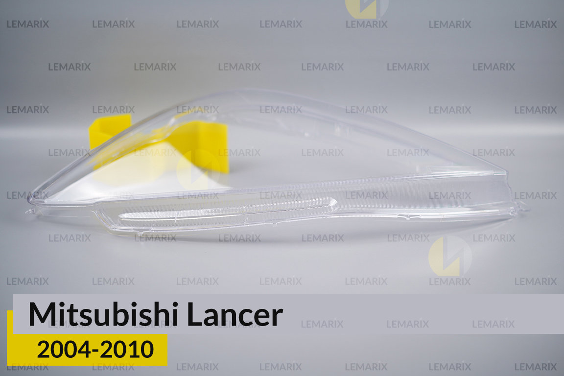 Скло фари Mitsubishi Lancer (2004-2010) ліве