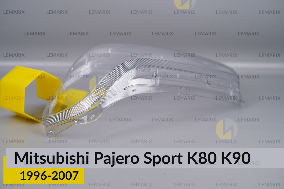 Скло фари Mitsubishi Pajero Sport K80 K90 (1996-2007) ліве