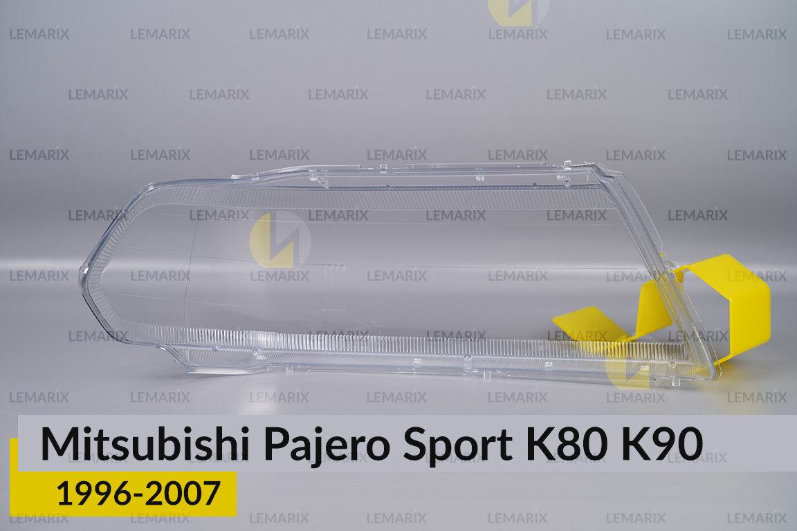 Скло фари Mitsubishi Pajero Sport K80 K90 (1996-2007) ліве