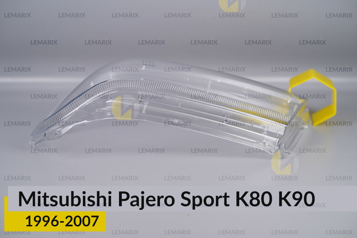 Скло фари Mitsubishi Pajero Sport K80 K90 (1996-2007) ліве