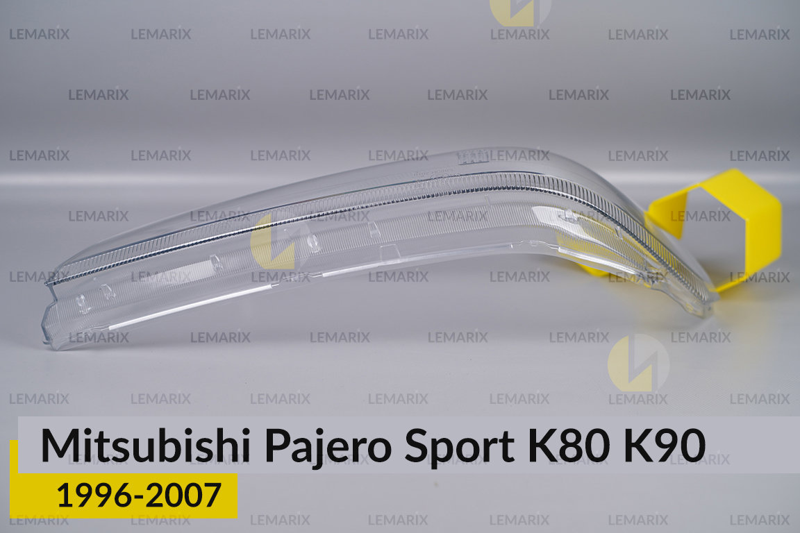 Скло фари Mitsubishi Pajero Sport K80 K90 (1996-2007) ліве