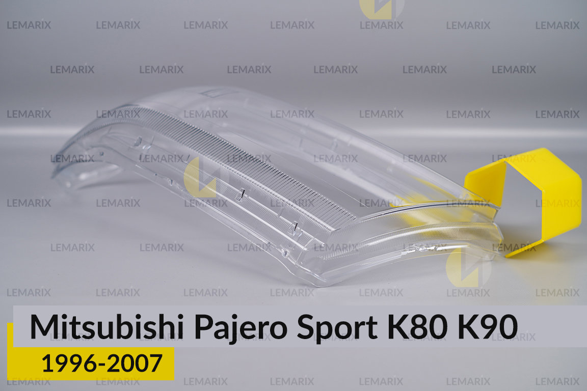 Скло фари Mitsubishi Pajero Sport K80 K90 (1996-2007) ліве