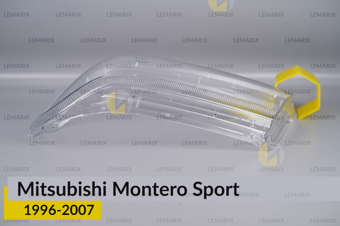 Скло фари Mitsubishi Montero Sport (1996-2007) ліве