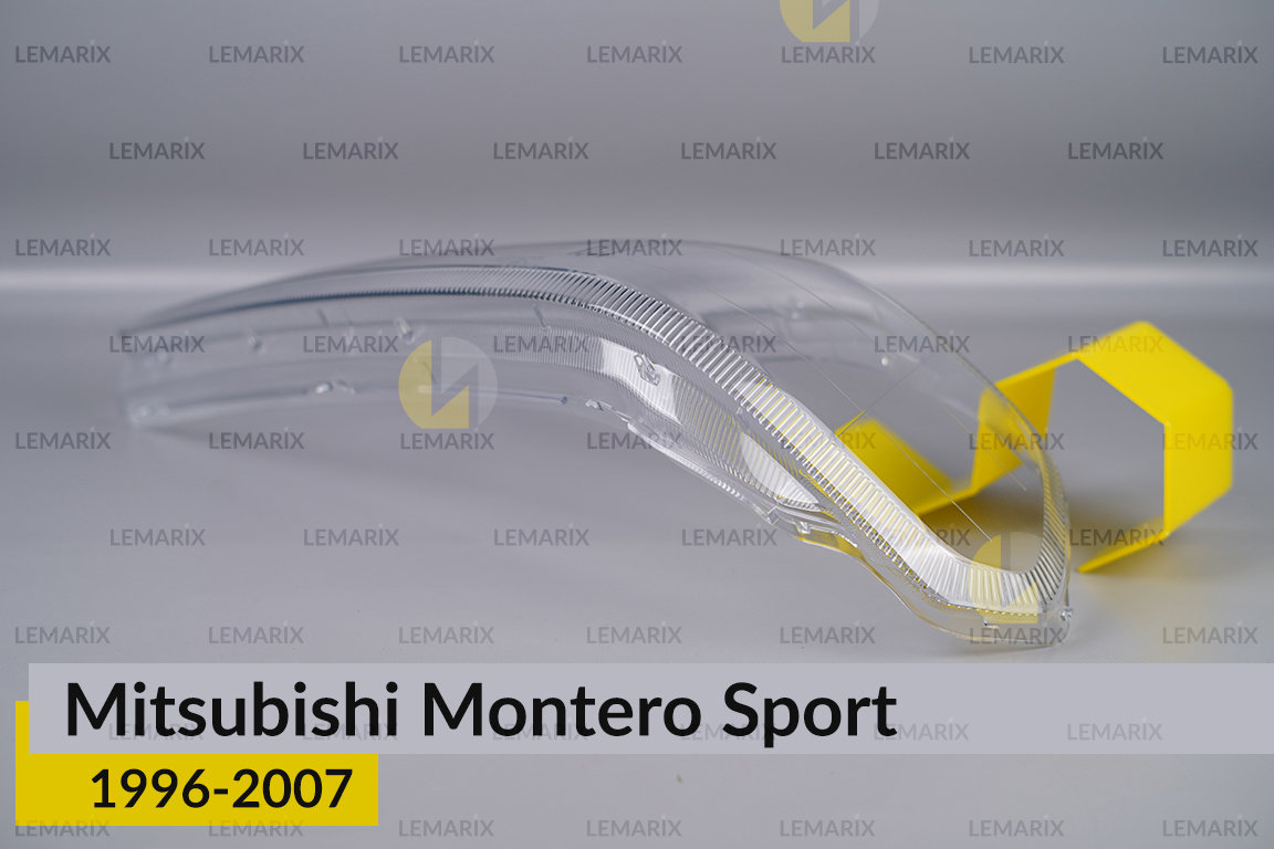 Скло фари Mitsubishi Montero Sport (1996-2007) ліве
