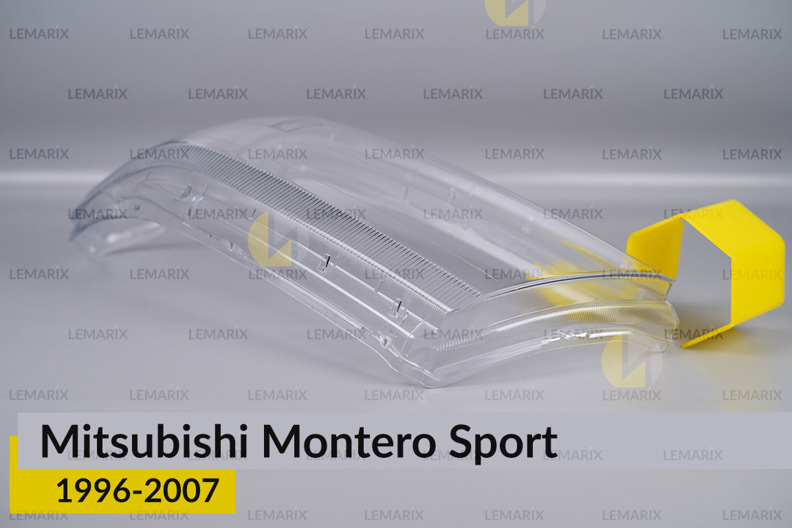 Скло фари Mitsubishi Montero Sport (1996-2007) ліве