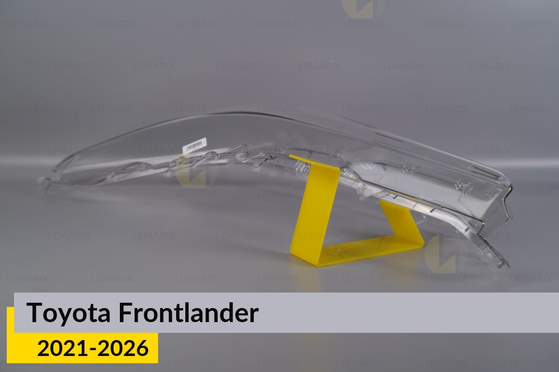 Скло фари Toyota Frontlander (2021-2026) ліве