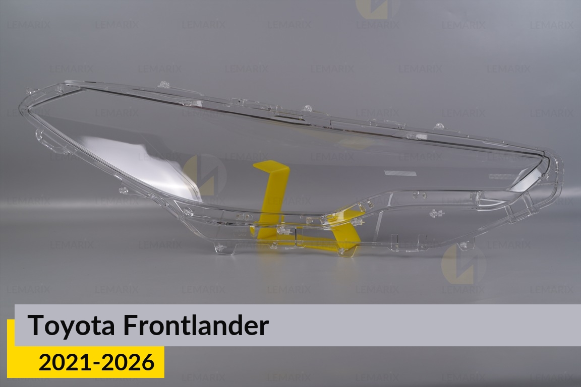 Скло фари Toyota Frontlander (2021-2026) ліве