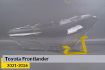 Скло фари Toyota Frontlander (2021-2026) ліве