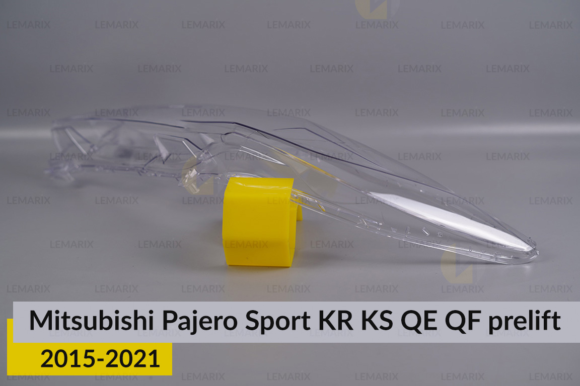 Скло фари Mitsubishi Pajero Sport KR KS QE QF (2015-2021) дорест ліве