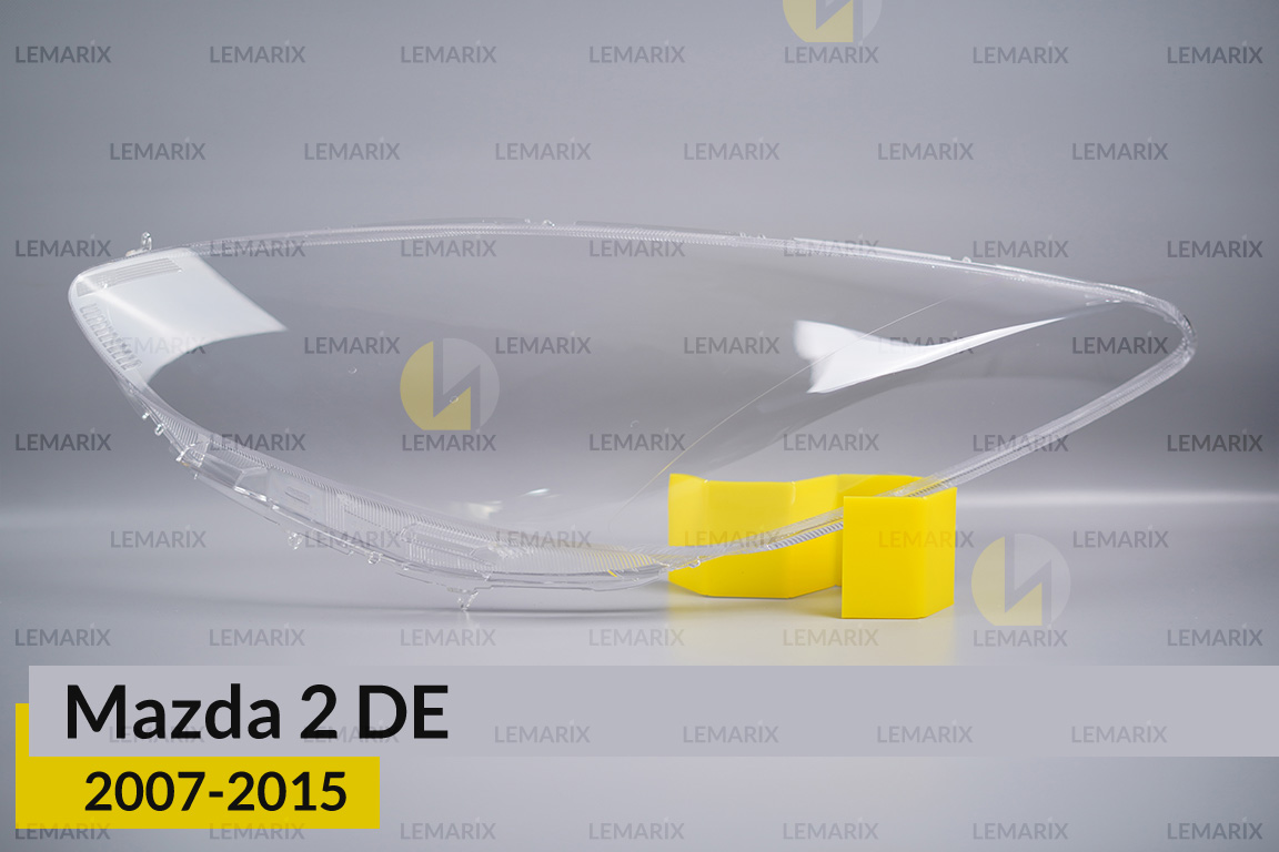Скло фари Mazda 2 DE (2007-2015) ліве