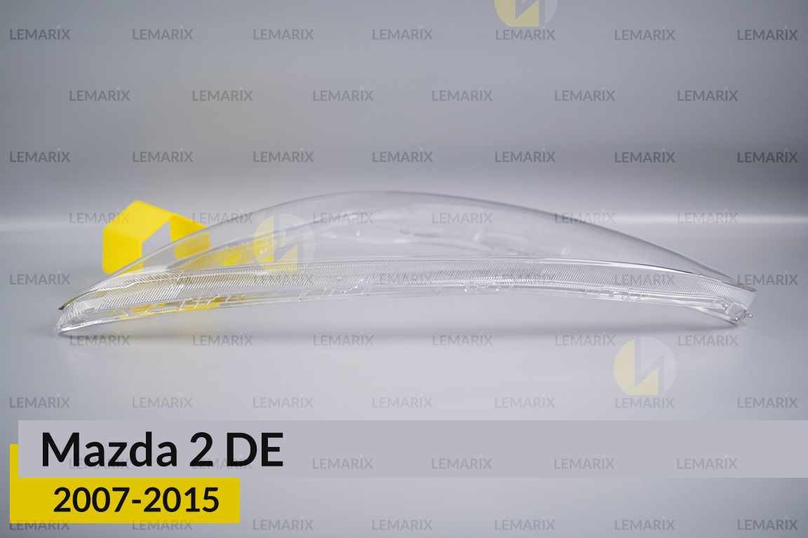 Скло фари Mazda 2 DE (2007-2015) ліве