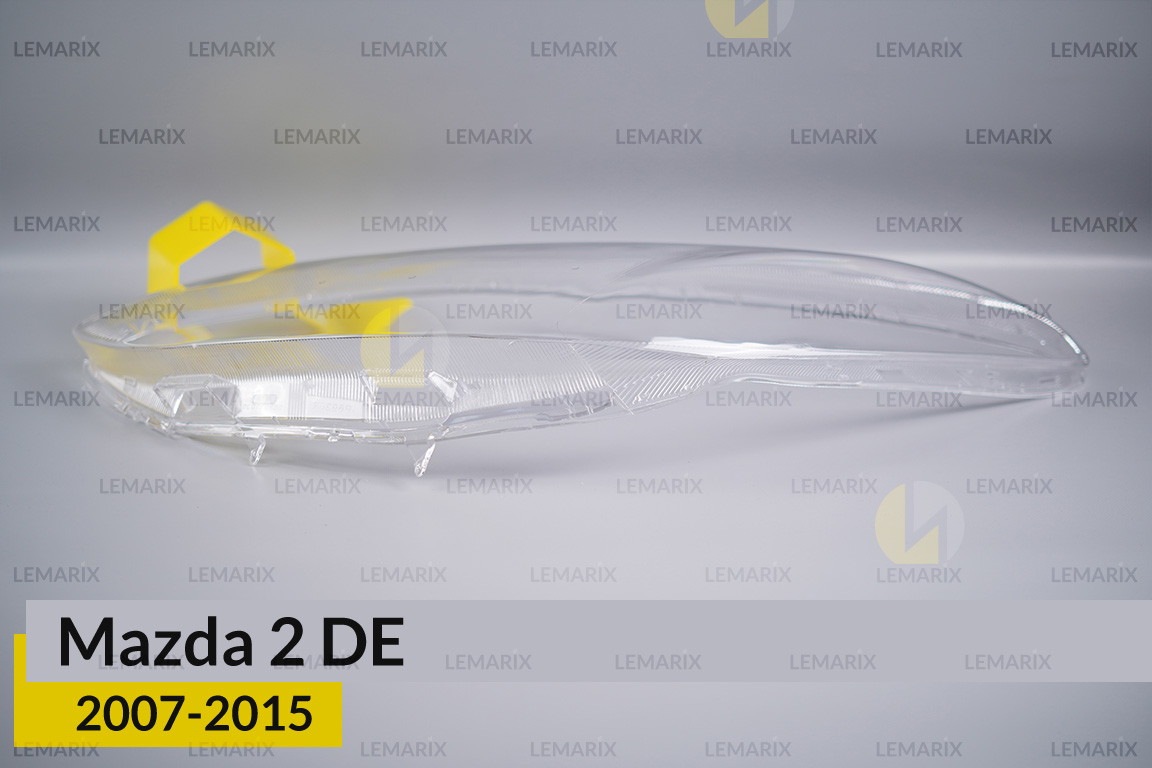 Скло фари Mazda 2 DE (2007-2015) ліве