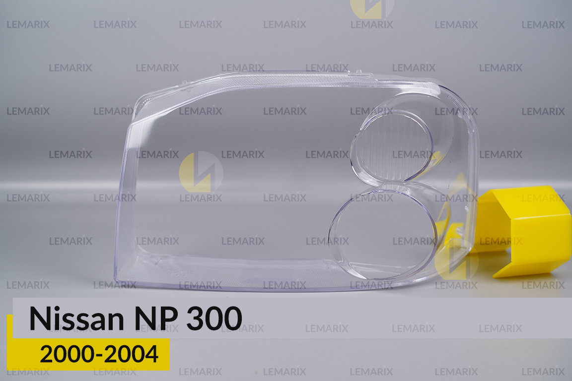 Скло фари Nissan NP 300 (2000-2004) ліве