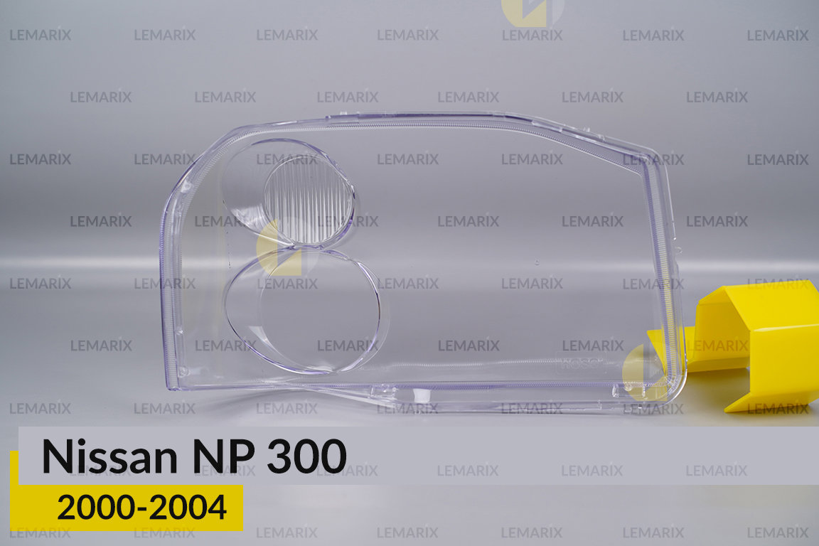 Скло фари Nissan NP 300 (2000-2004) ліве