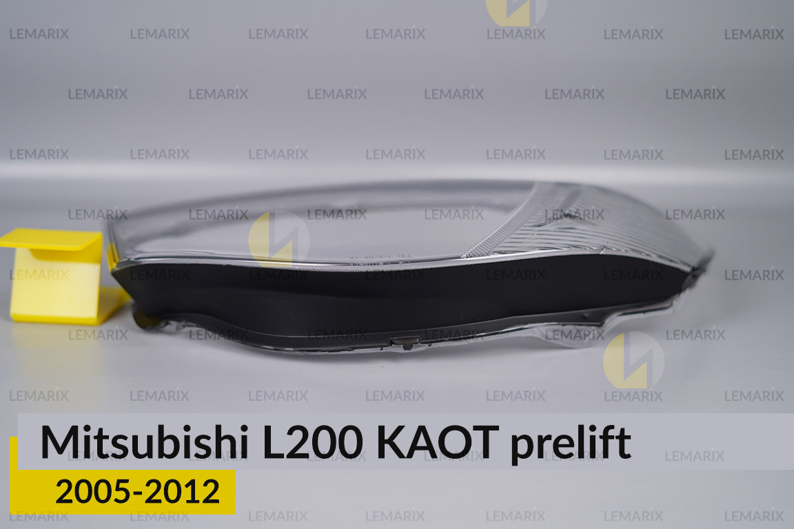 Скло фари Mitsubishi L200 KAOT (2005-2012) дорест ліве