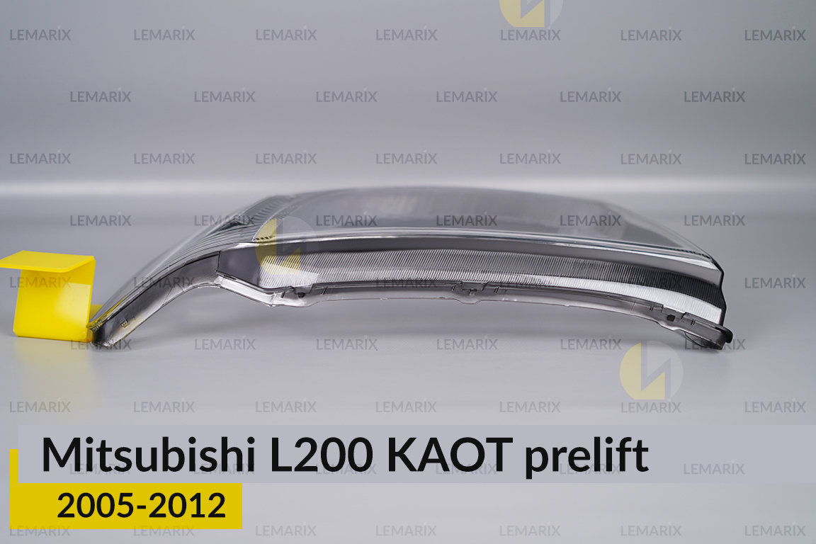 Скло фари Mitsubishi L200 KAOT (2005-2012) дорест ліве