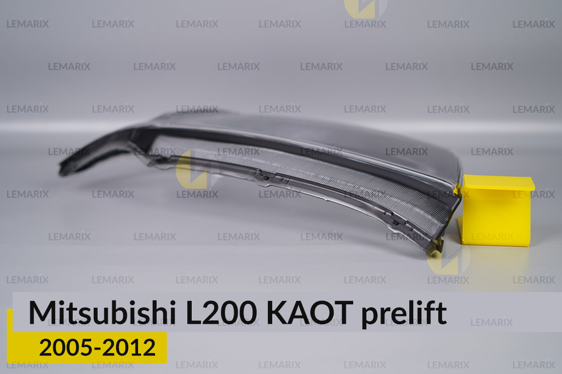 Скло фари Mitsubishi L200 KAOT (2005-2012) дорест ліве