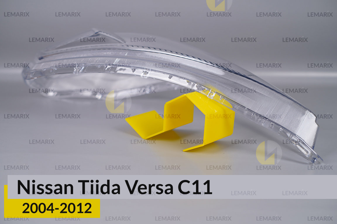 Скло фари Nissan Tiida Versa C11 (2004-2012) ліве