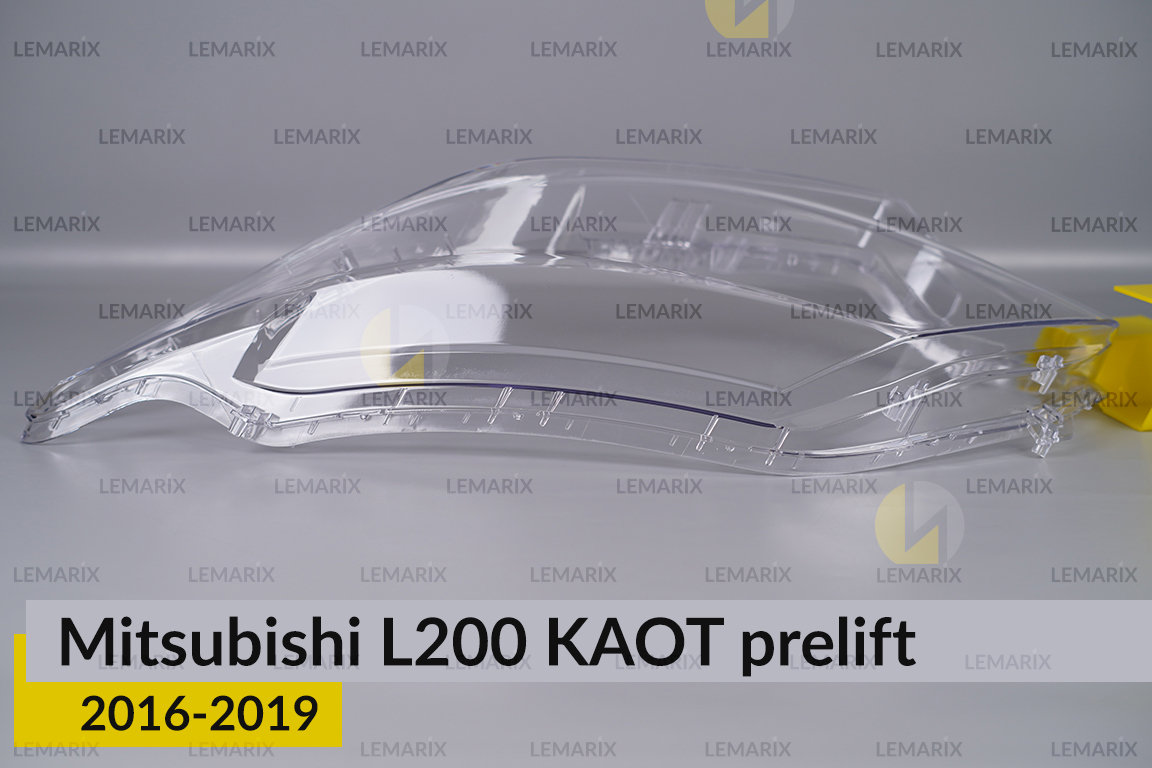 Скло фари Mitsubishi L200 KAOT (2016-2019) дорест ліве
