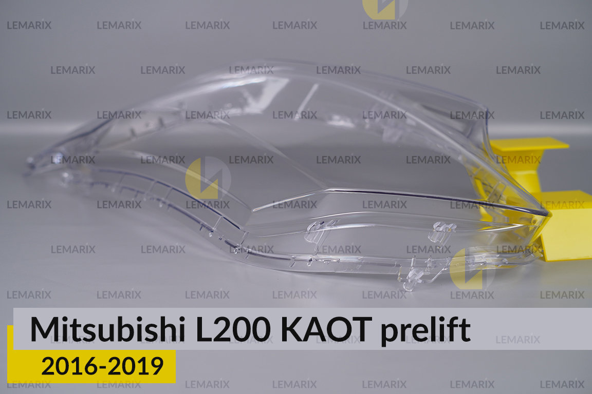 Скло фари Mitsubishi L200 KAOT (2016-2019) дорест ліве