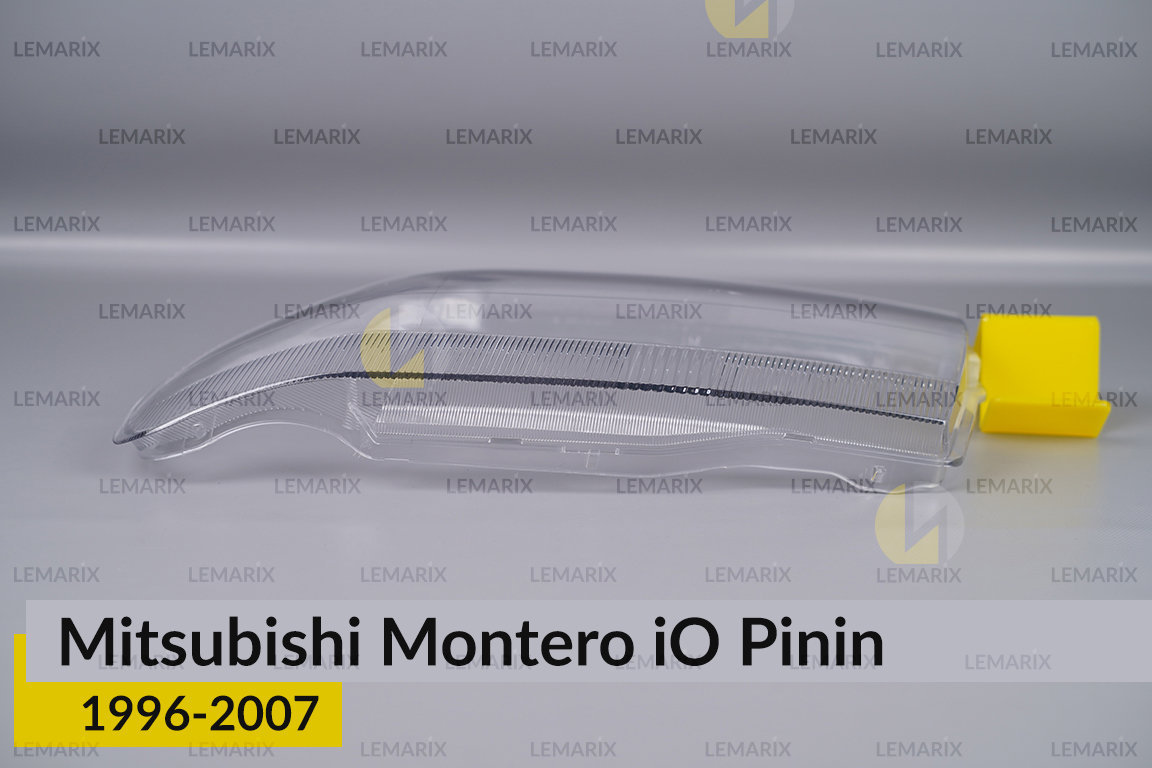 Скло фари Mitsubishi Montero iO Pinin (1996-2007) ліве