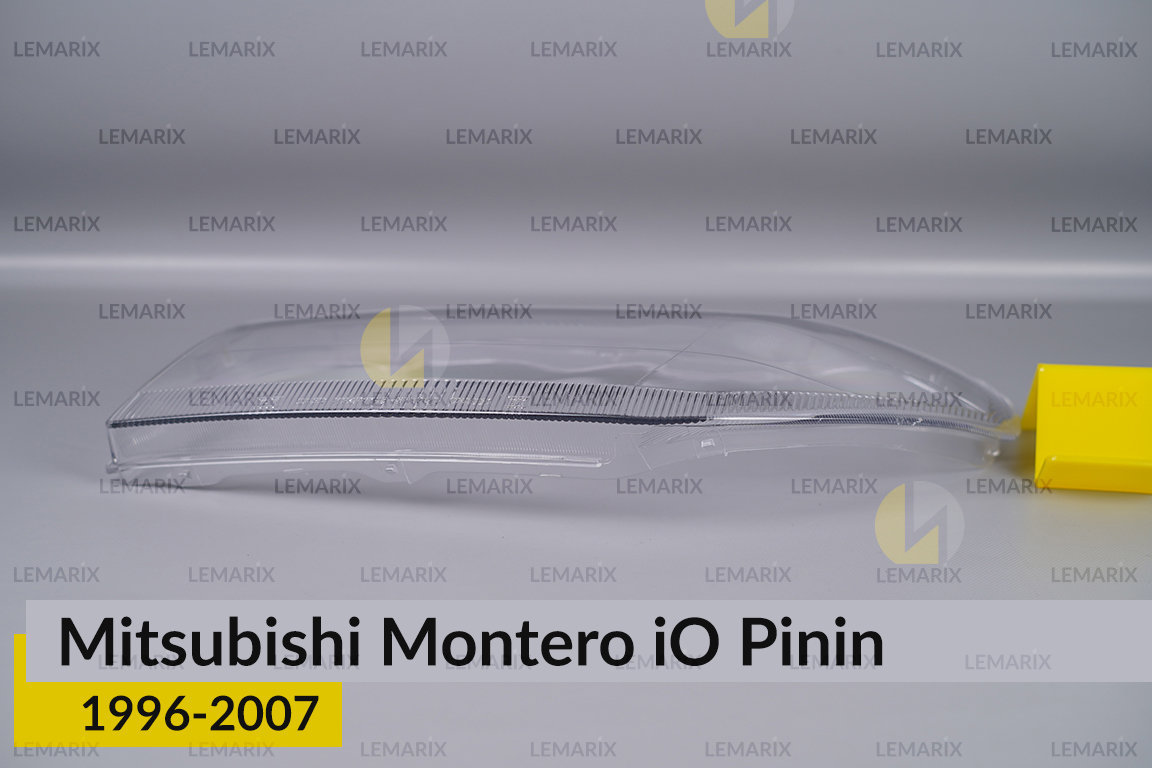 Скло фари Mitsubishi Montero iO Pinin (1996-2007) ліве