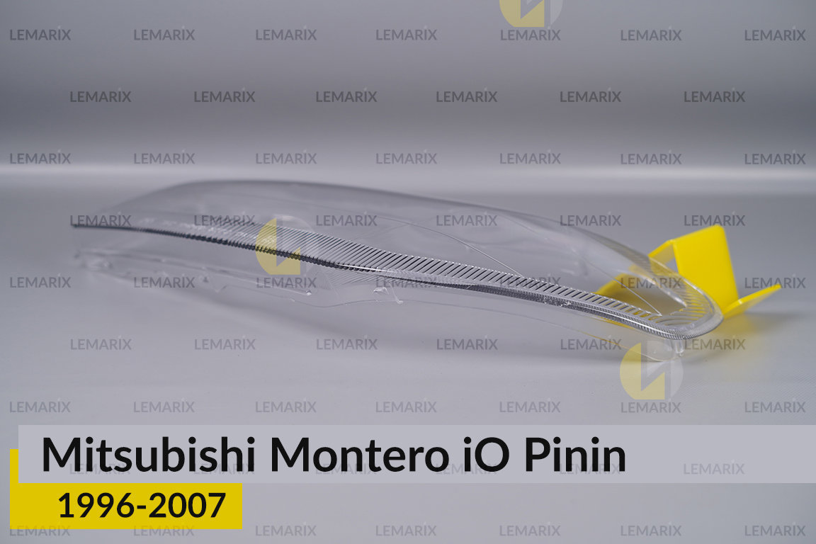 Скло фари Mitsubishi Montero iO Pinin (1996-2007) ліве