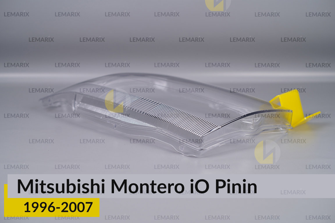 Скло фари Mitsubishi Montero iO Pinin (1996-2007) ліве