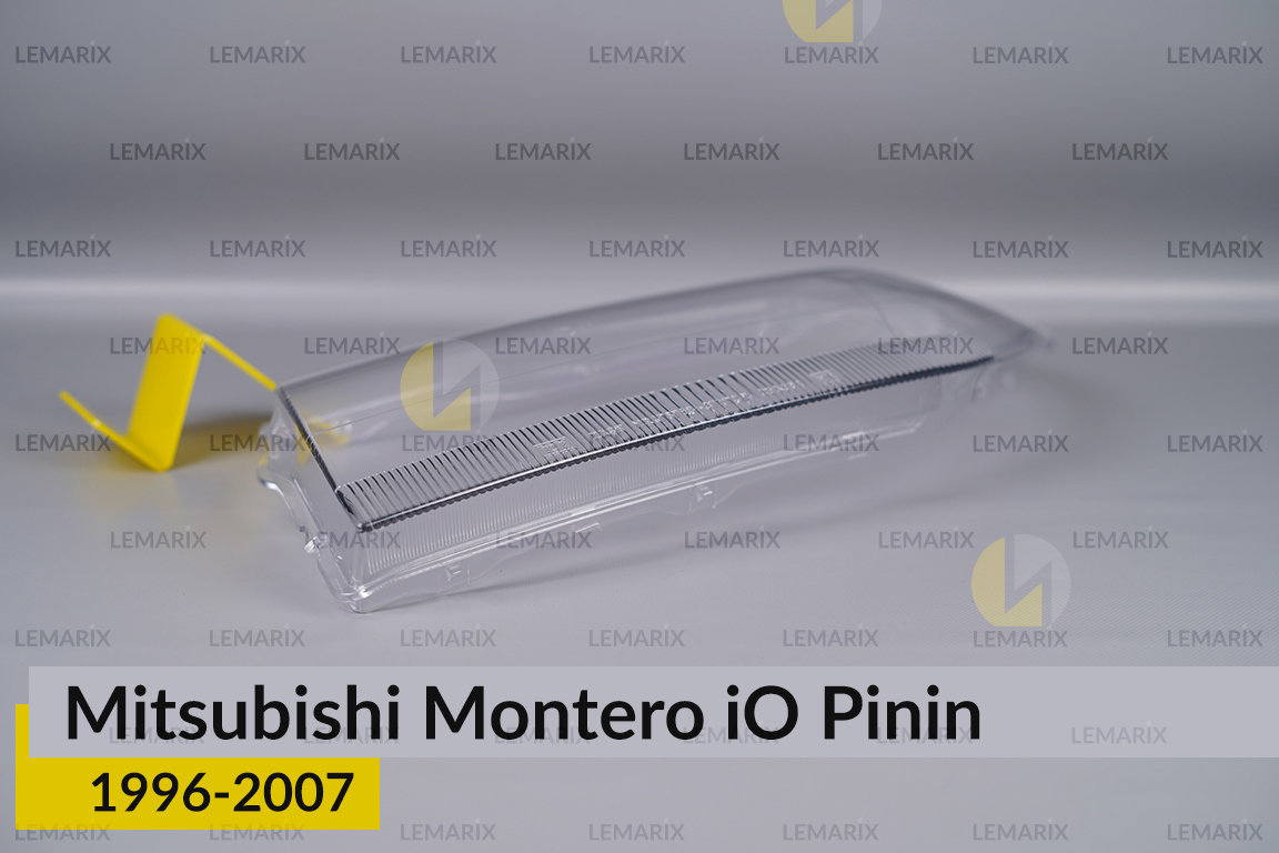 Скло фари Mitsubishi Montero iO Pinin (1996-2007) ліве
