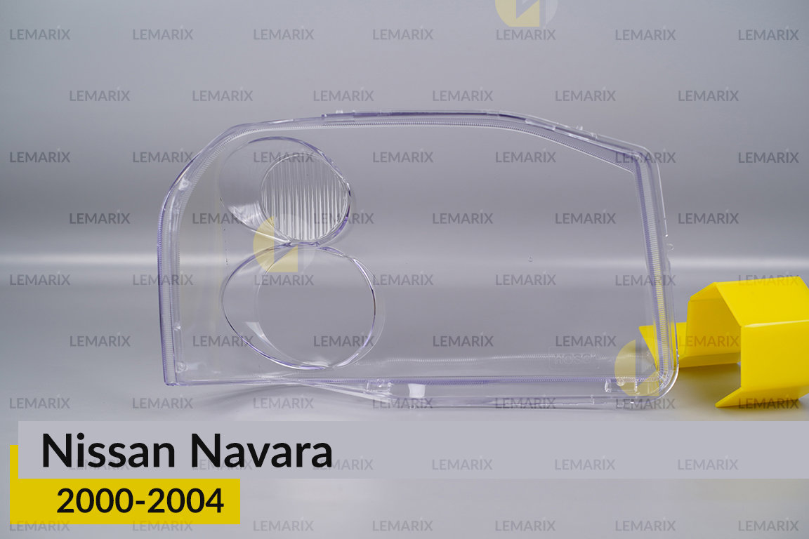 Скло фари Nissan Navara (2000-2004) ліве