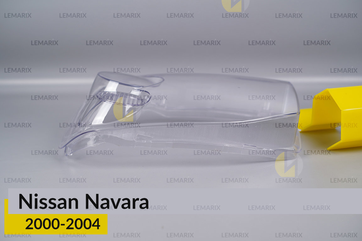 Скло фари Nissan Navara (2000-2004) ліве