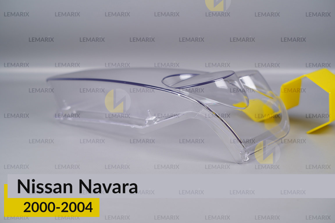 Скло фари Nissan Navara (2000-2004) ліве