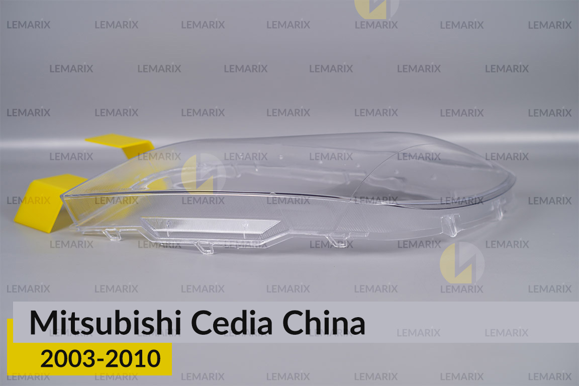 Скло фари Mitsubishi Cedia China (2003-2010) ліве