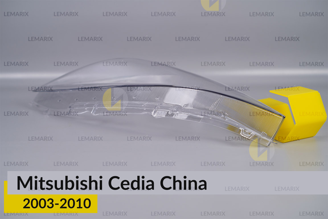 Скло фари Mitsubishi Cedia China (2003-2010) ліве