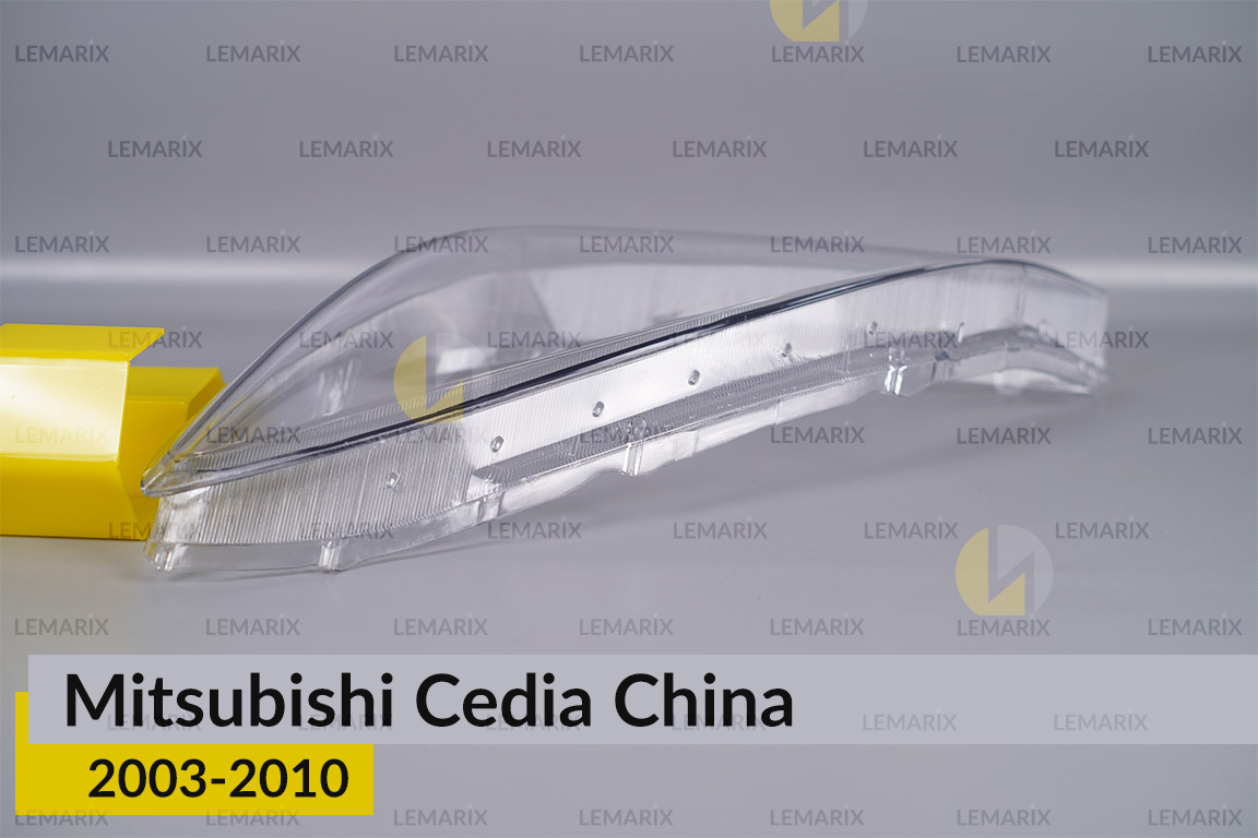 Скло фари Mitsubishi Cedia China (2003-2010) ліве