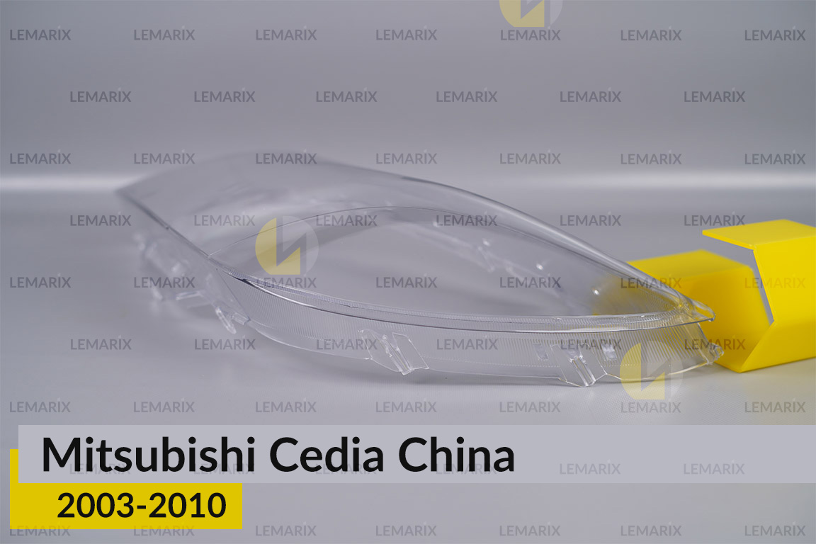 Скло фари Mitsubishi Cedia China (2003-2010) ліве