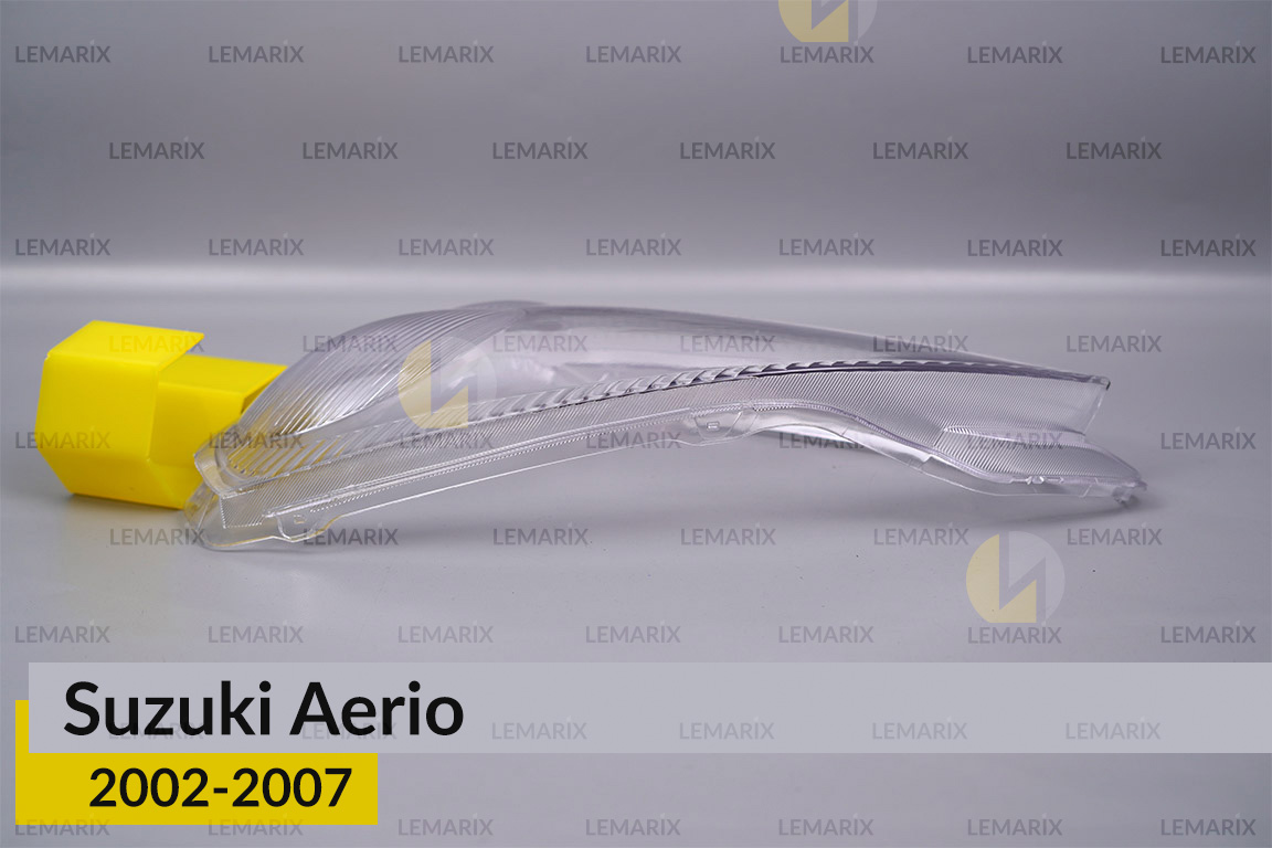 Скло фари Suzuki Aerio (2002-2007) ліве