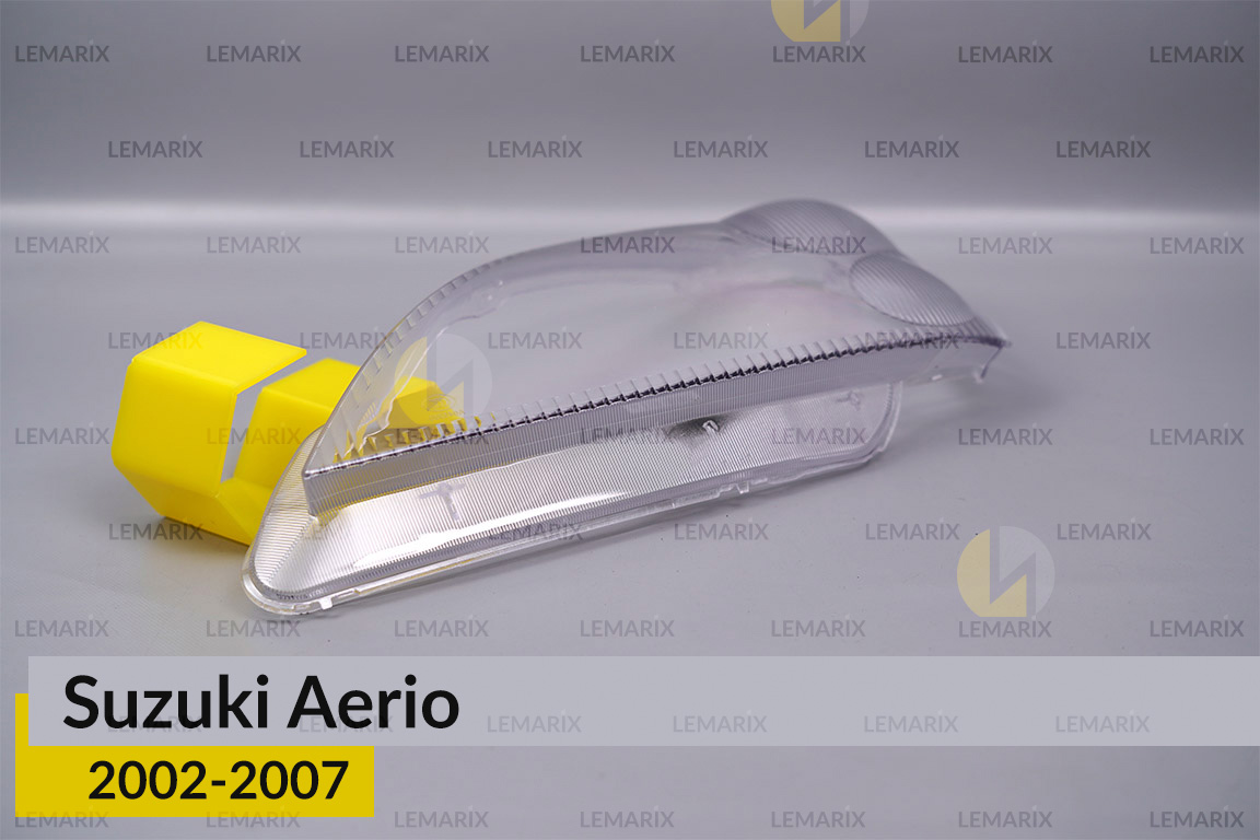 Скло фари Suzuki Aerio (2002-2007) ліве