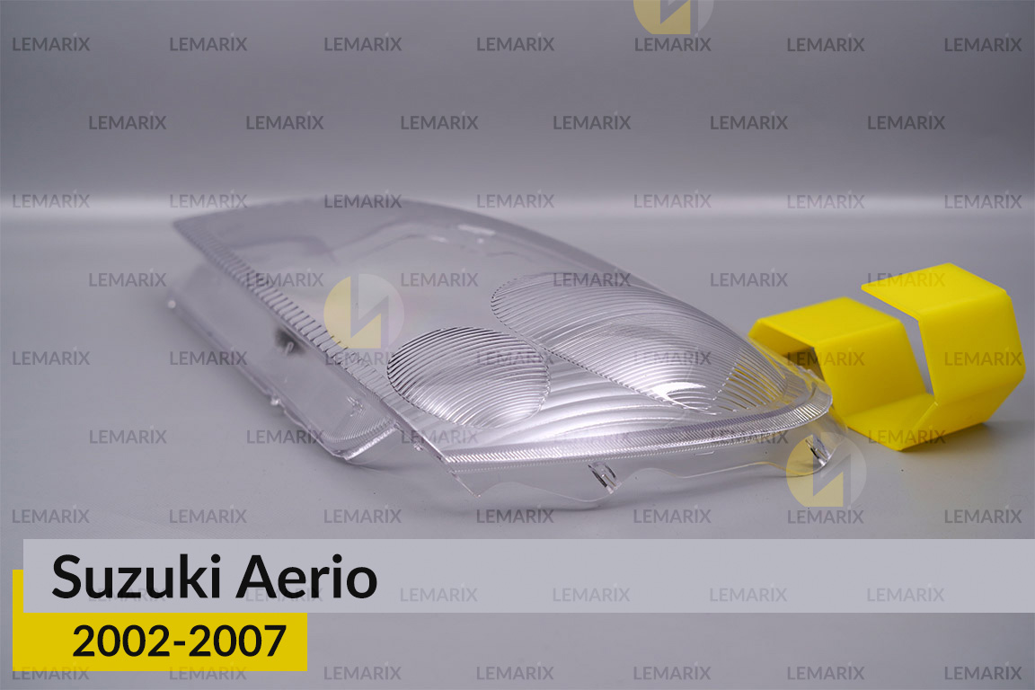 Скло фари Suzuki Aerio (2002-2007) ліве