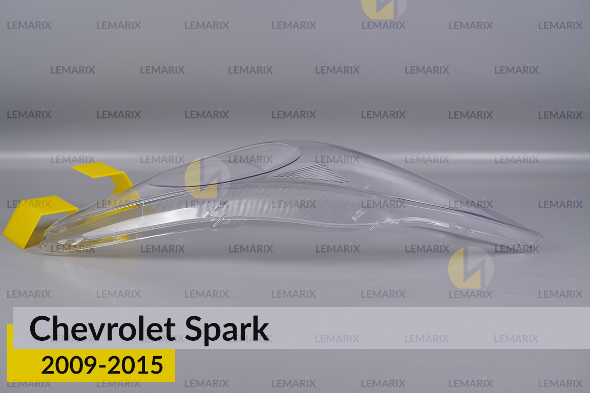 Скло фари Chevrolet Spark (2009-2015) ліве