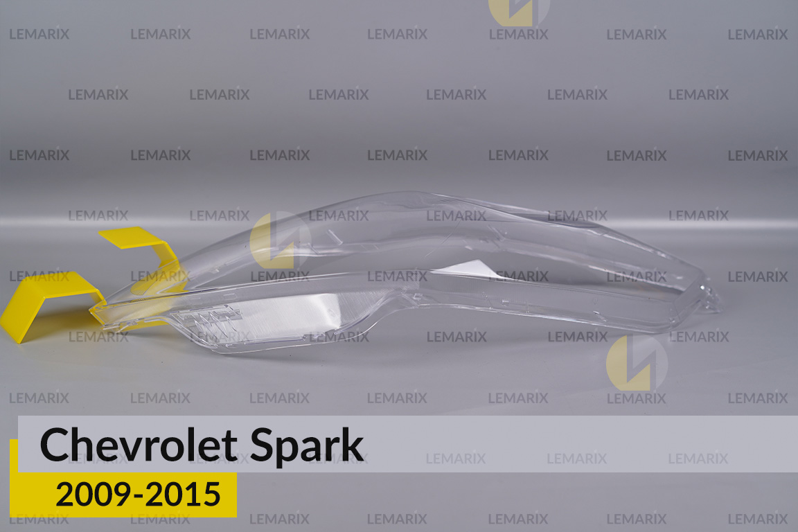 Скло фари Chevrolet Spark (2009-2015) ліве
