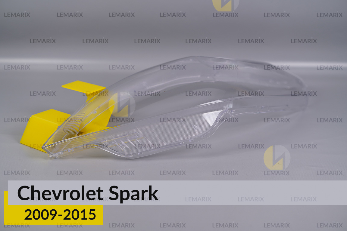 Скло фари Chevrolet Spark (2009-2015) ліве