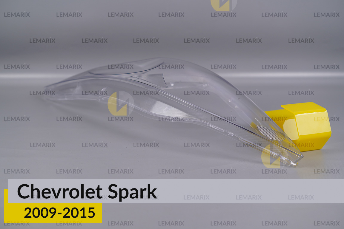 Скло фари Chevrolet Spark (2009-2015) ліве