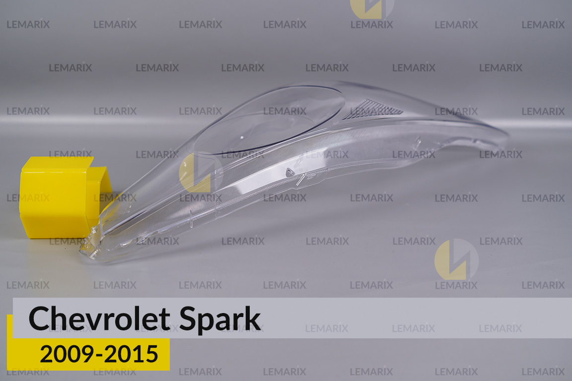 Скло фари Chevrolet Spark (2009-2015) ліве