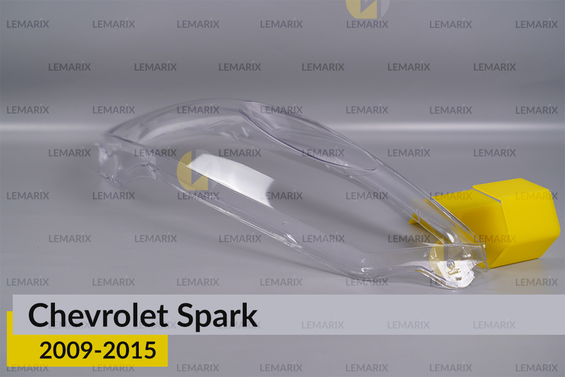 Скло фари Chevrolet Spark (2009-2015) ліве