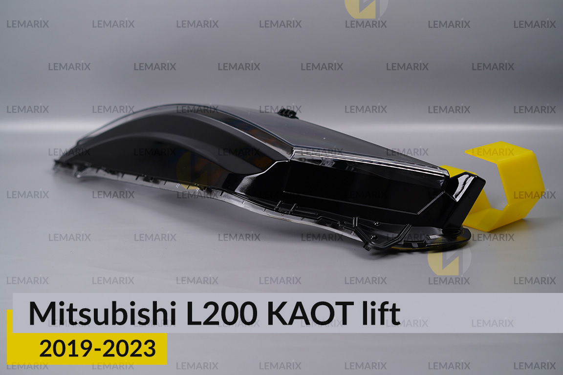 Скло фари Mitsubishi L200 KAOT (2019-2023) рест ліве