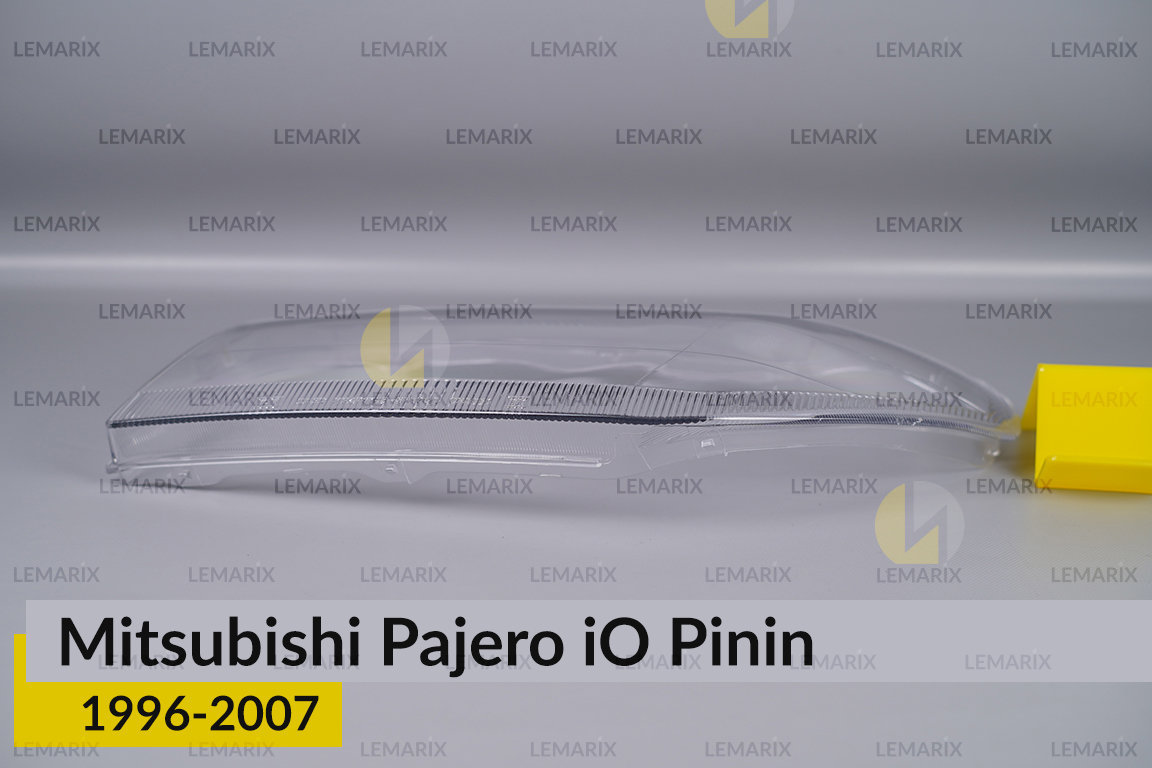 Скло фари Mitsubishi Pajero iO Pinin (1996-2007) ліве