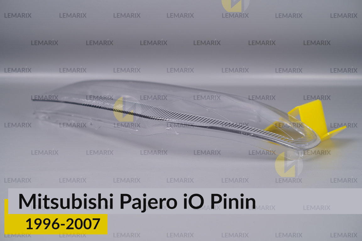 Скло фари Mitsubishi Pajero iO Pinin (1996-2007) ліве