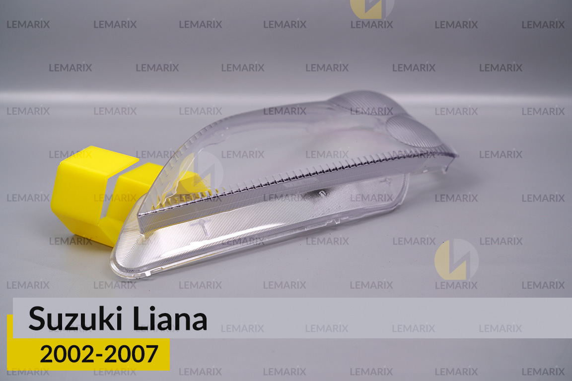 Скло фари Suzuki Liana (2002-2007) ліве