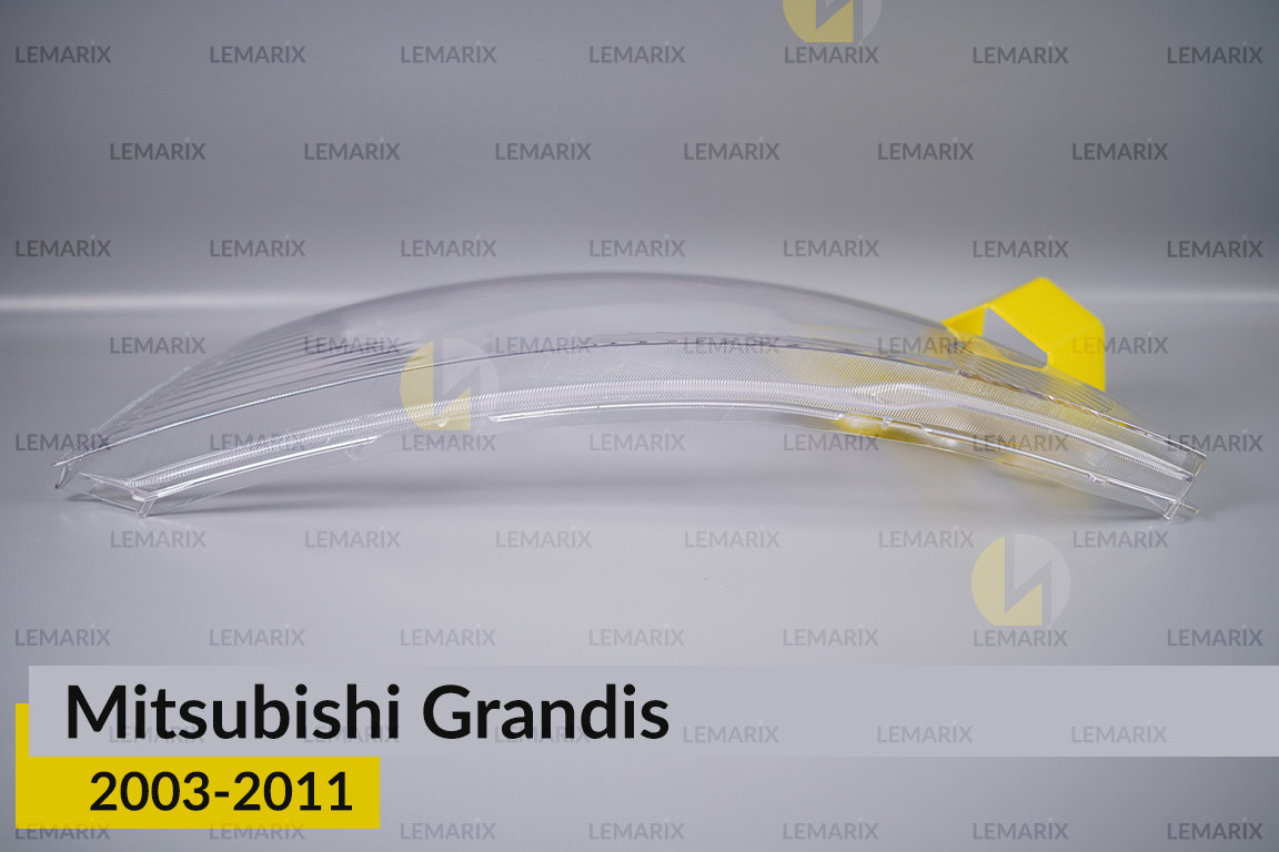 Скло фари Mitsubishi Grandis (2003-2011) ліве